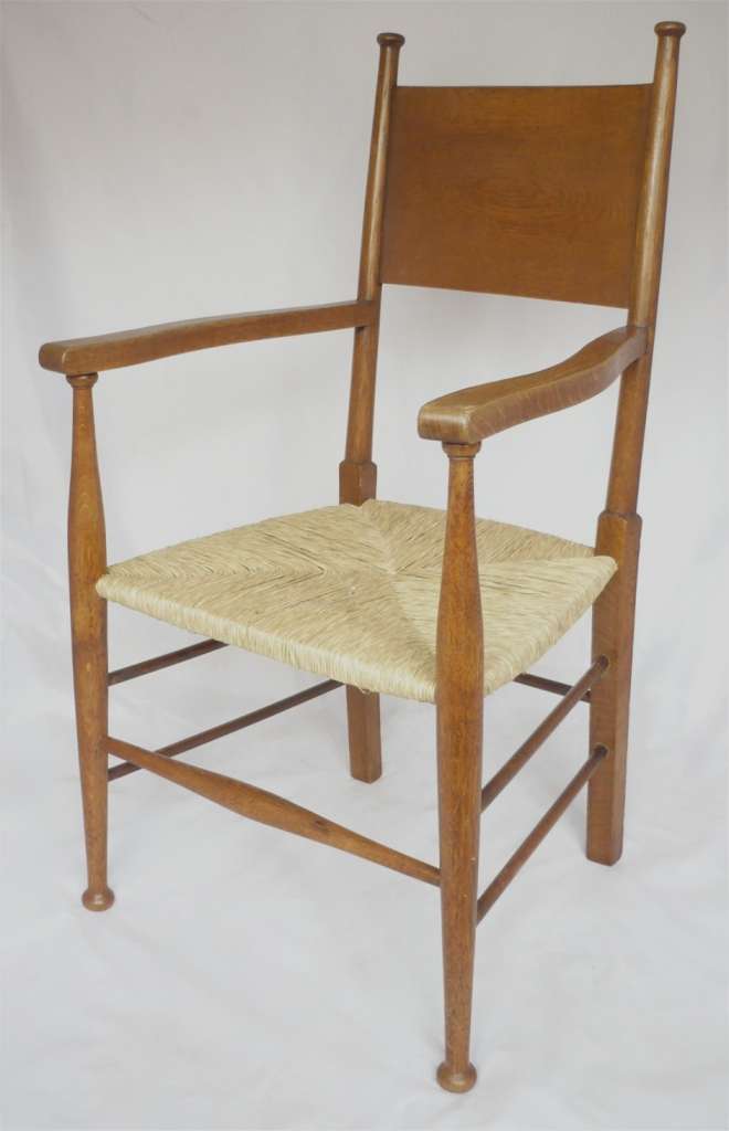 Pair of arts and crafts armchairs after W Birch
