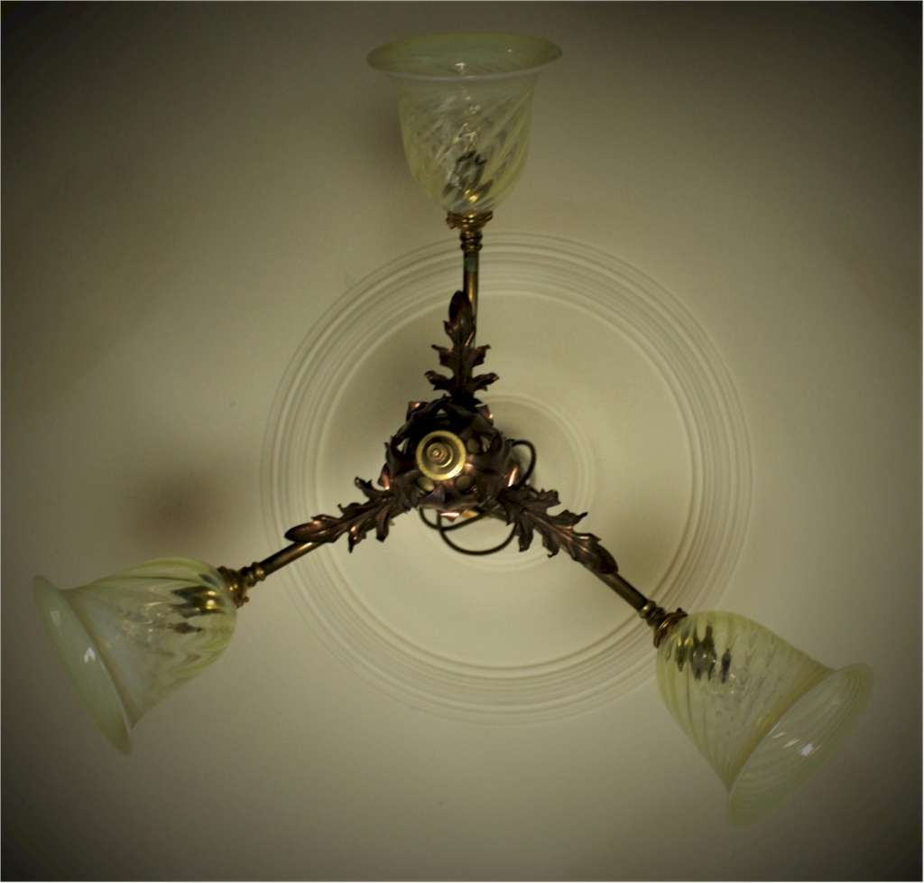 Arts and crafts three branch ceiling light in iron and copper