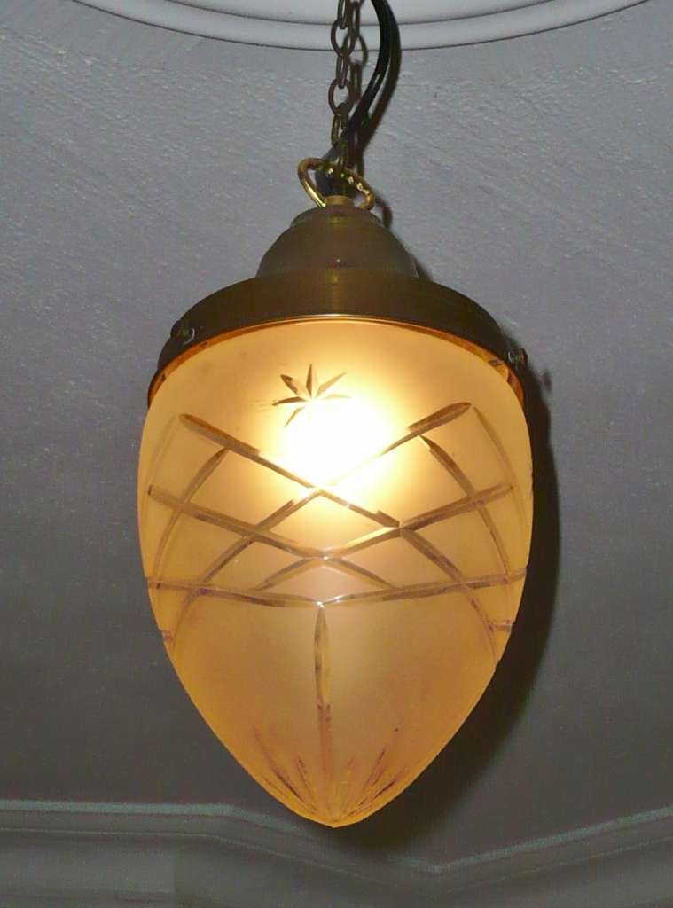 Conical ceiling light with engraved decoration