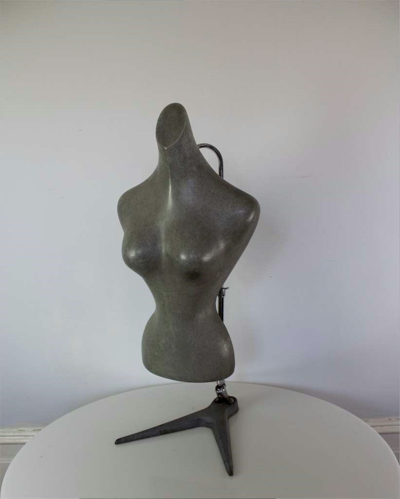 Shop fitting female torso in grey molded plastic