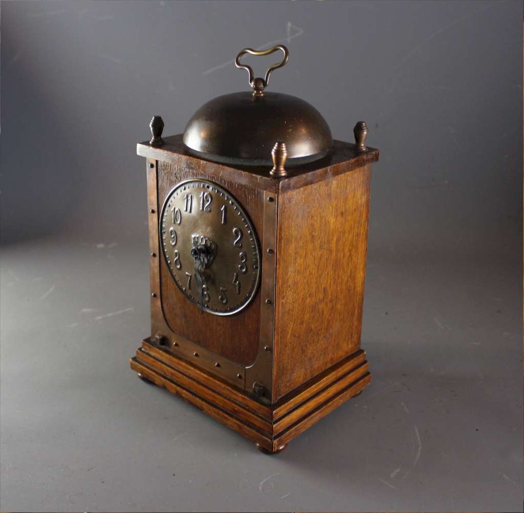 Arts and Crafts oak and copper mantel clock Liberty & Co