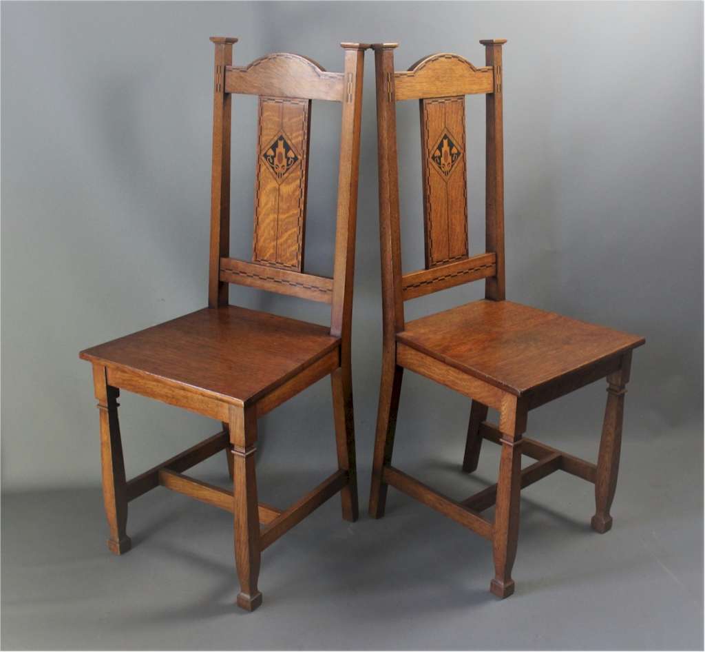 Shapland and Petter pair of oak hall chairs