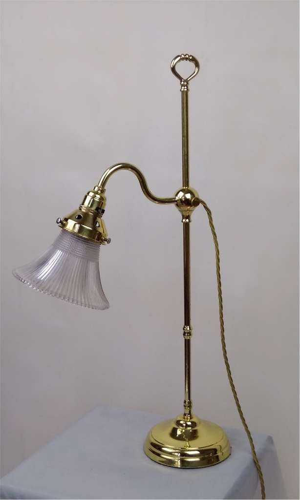 Adjustable library table lamp in brass
