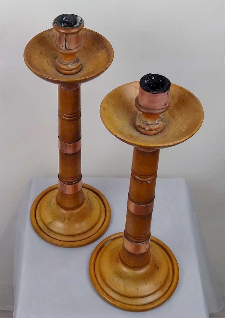 Handsome pair of boxwood arts and crafts candlesticks