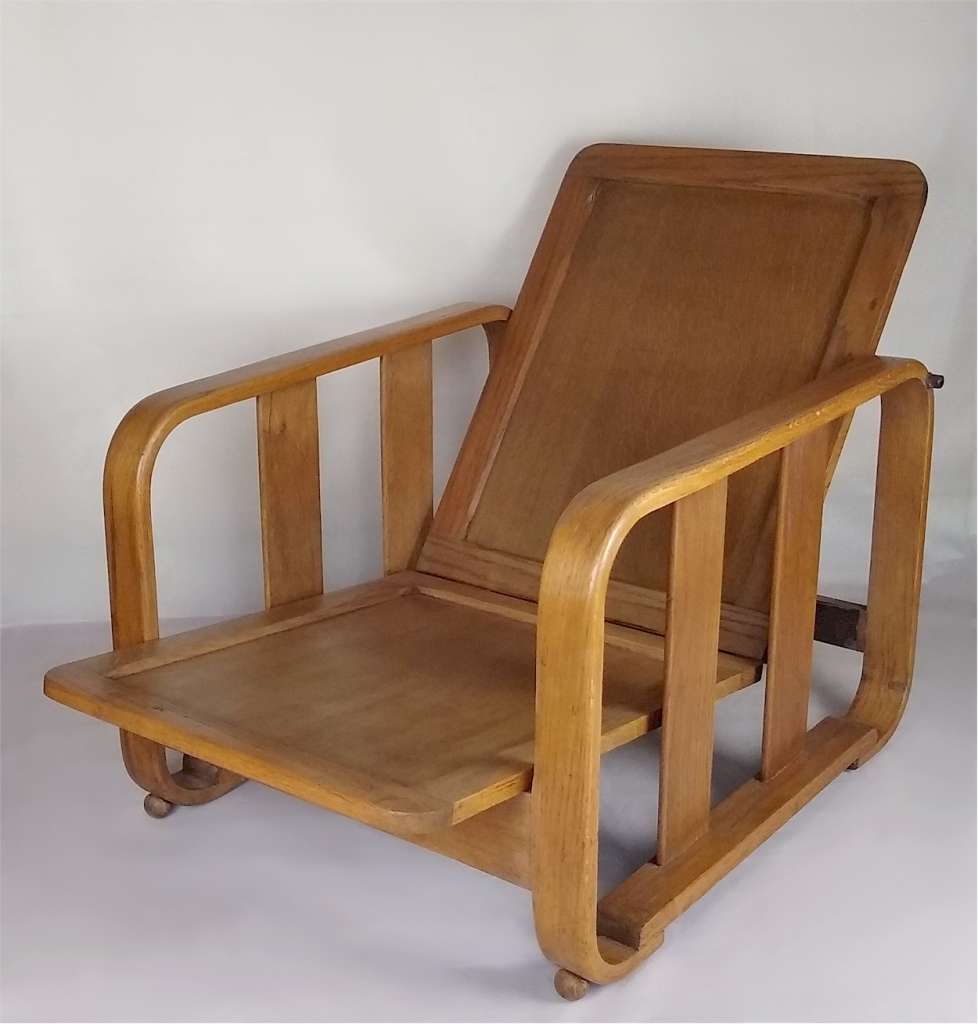 Pair of Heals adjustable armchairs in pale oak