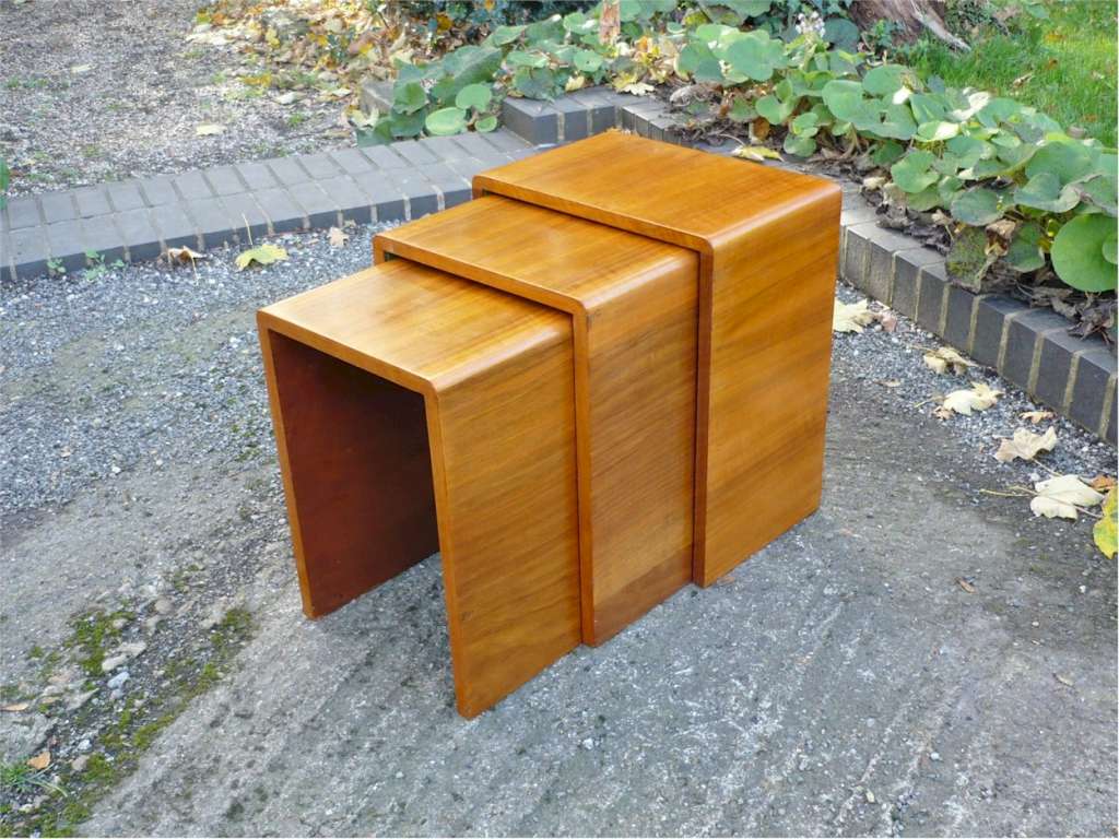  Small nest of figured walnut tables probably by Heals