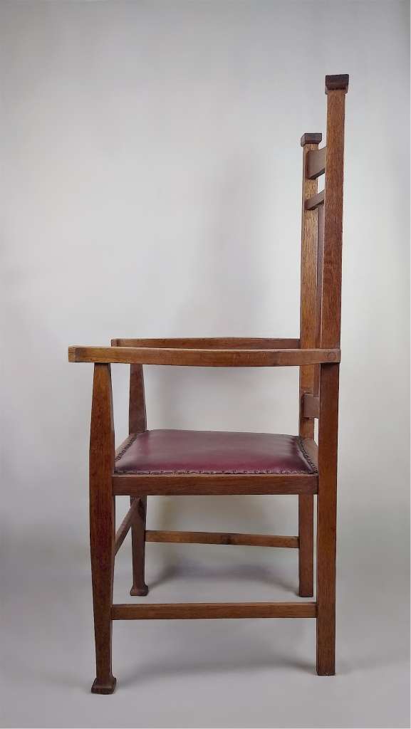 Single arts and crafts armchair in oak
