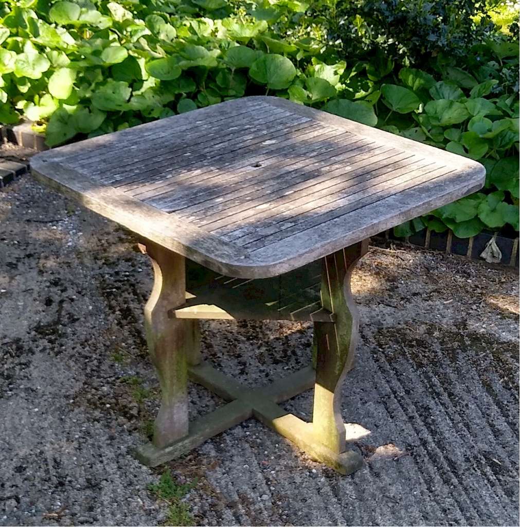 Heals garden table and chairs in teak