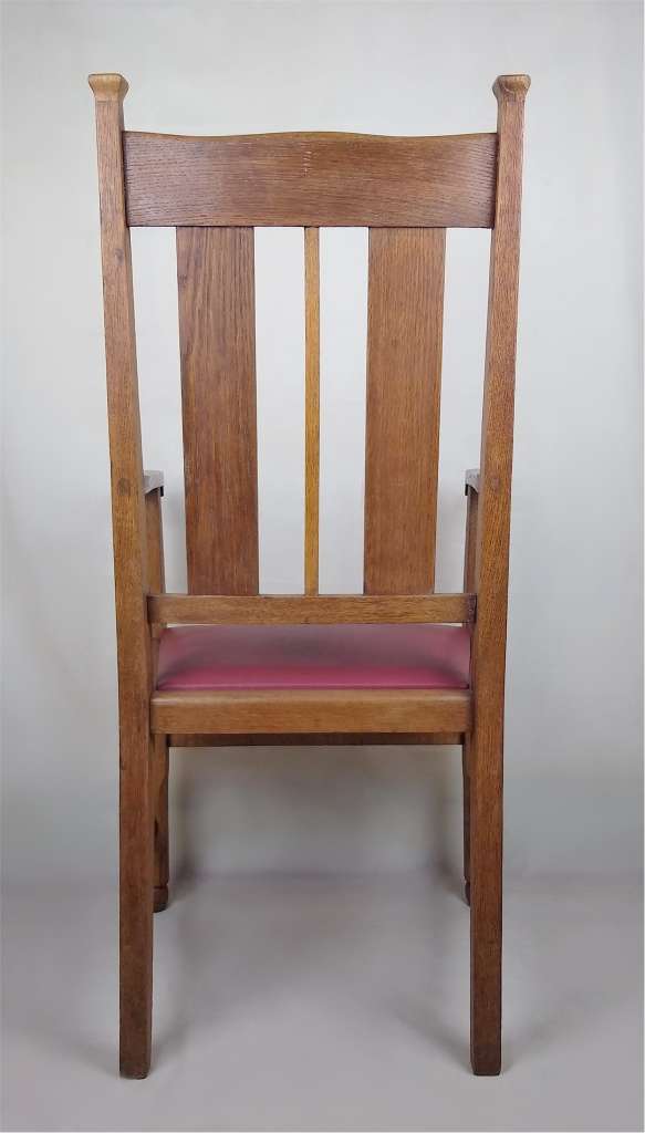 Pr of Liberty & Co armchairs in oak