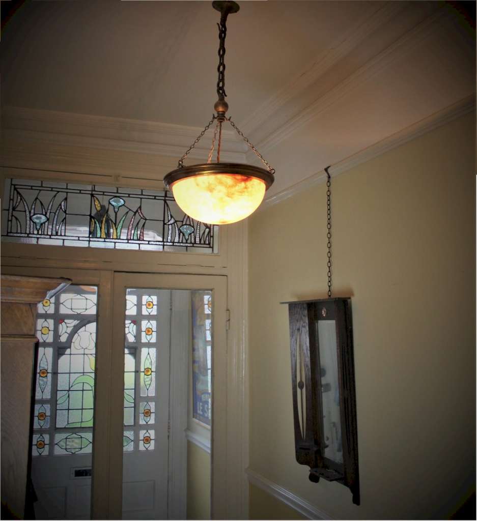 Alabaster ceiling shade bowl with coppered rim,