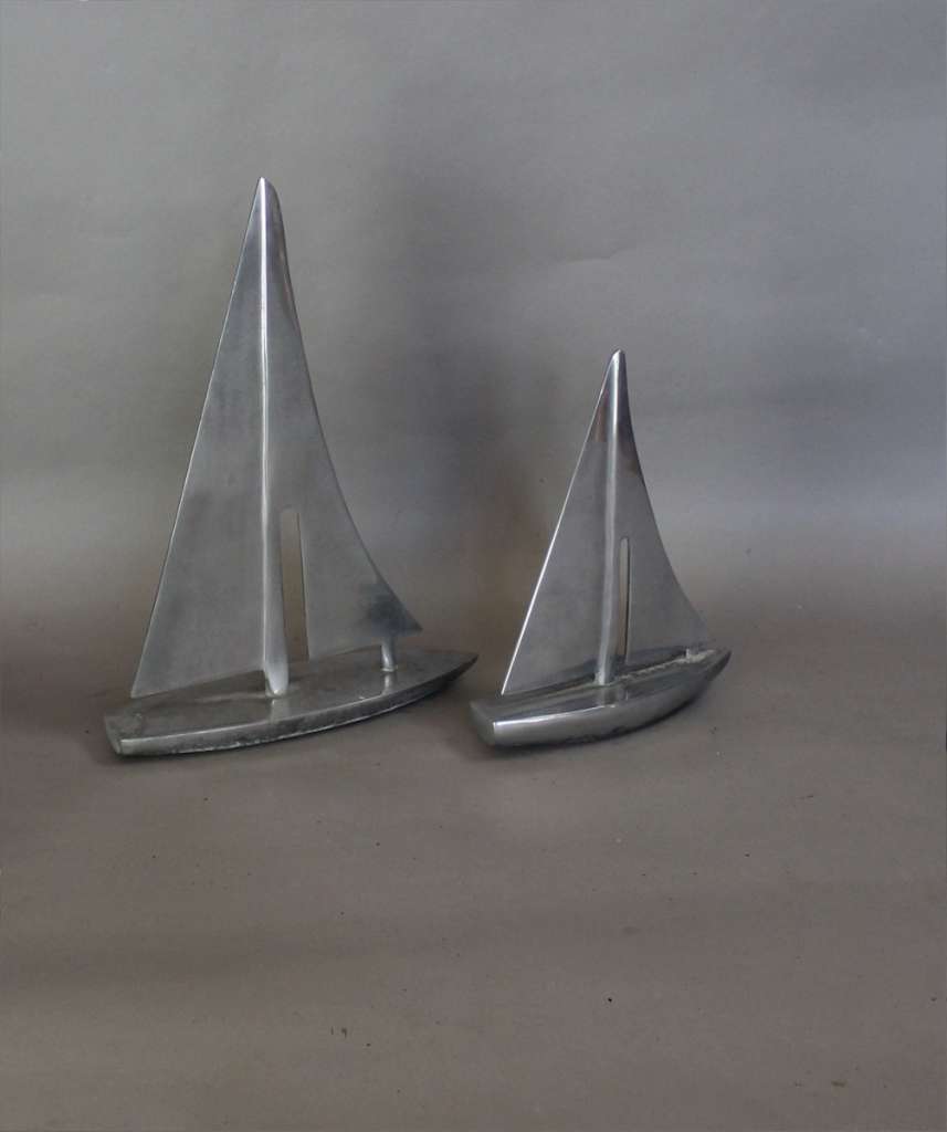 Two aluminium deco sailing yachts