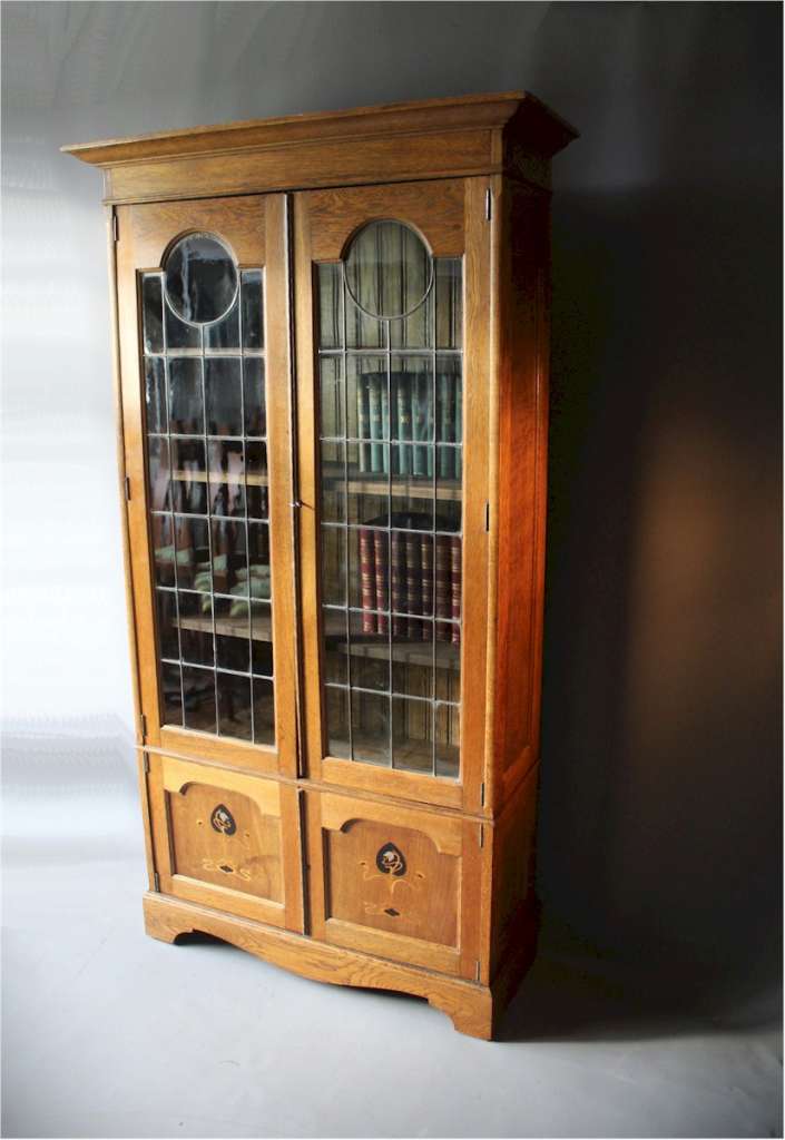 Arts and Crafts oak pewter inlaid bookcase