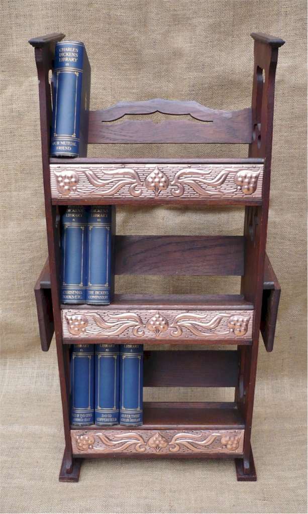 Arts and crafts bookcase with copper panels