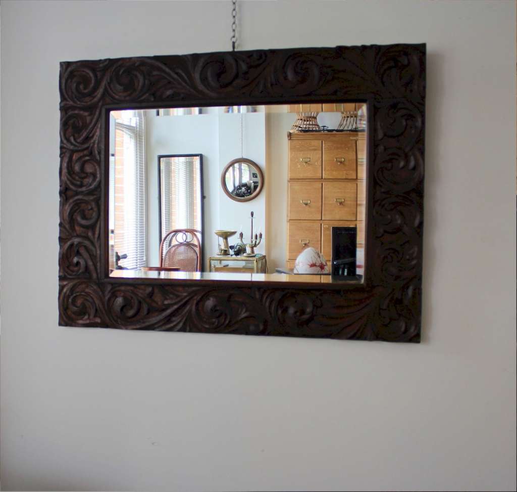 Large arts and crafts carved oak framed mirror