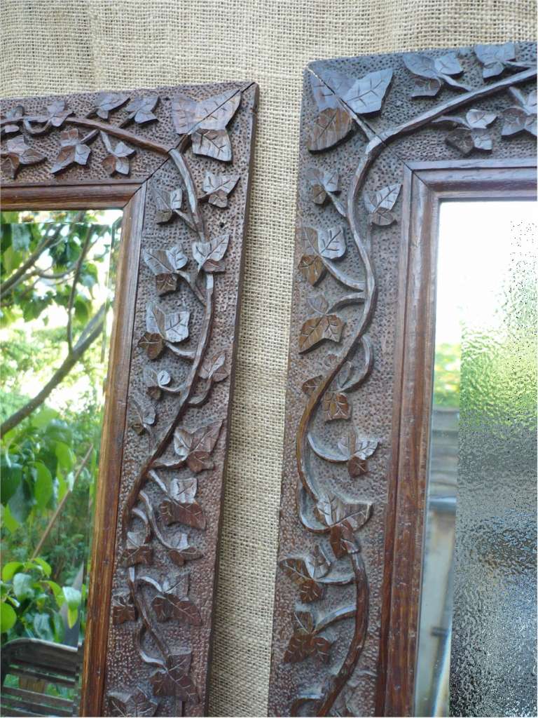 Pretty pair of arts and crafts mirrors in oak
