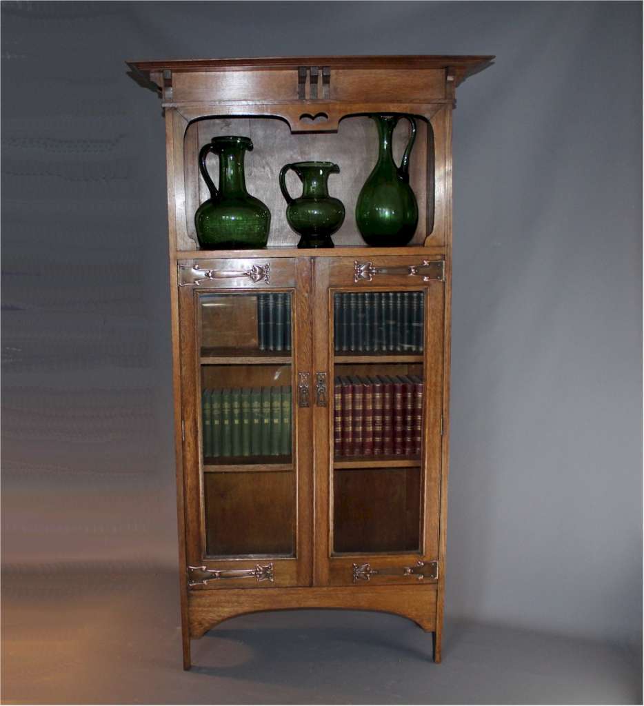 Arts and crafts copper strap oak bookcase