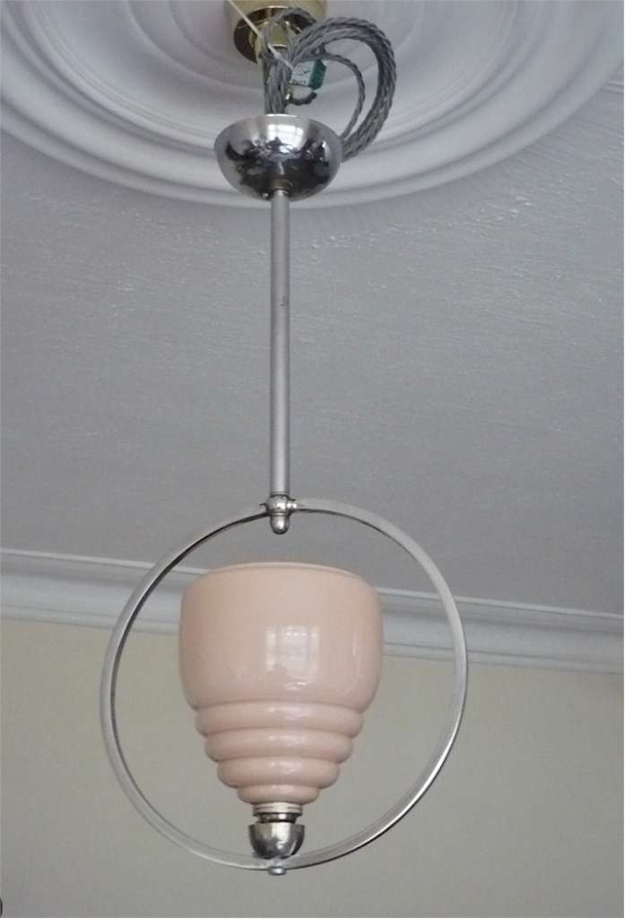 Art Deco ceiling light in chrome , peach glass shade