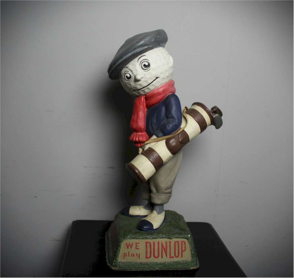A Dunlop caddy papier-mache  golf ball advertising figure