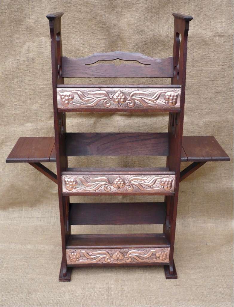 Arts and crafts bookcase with copper panels
