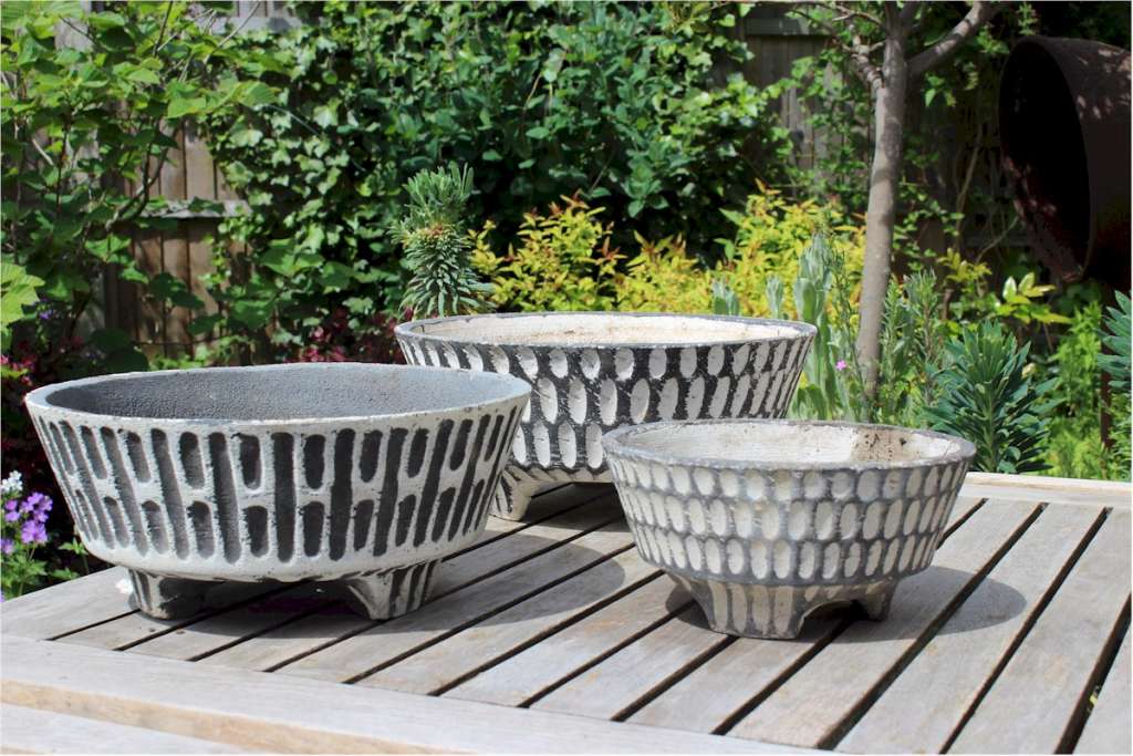 Three Fifties garden pots. Black and white