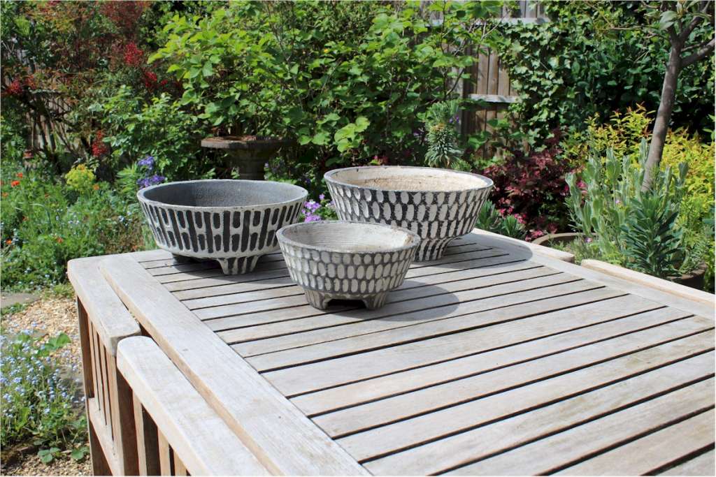 Three Fifties garden pots. Black and white