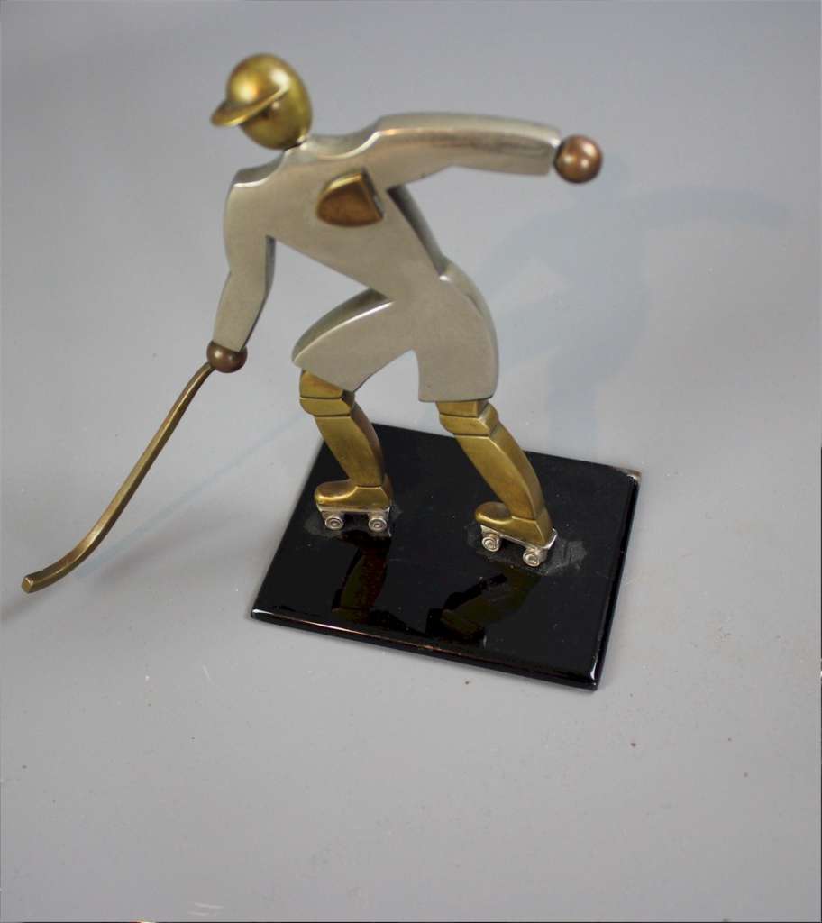 Art Deco brass figure of an ice hockey player