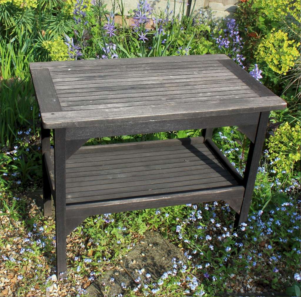 Teak garden table by Hughes Bolckow