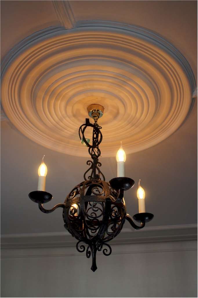 Arts and crafts iron hanging four branch ceiling lamp .c1910