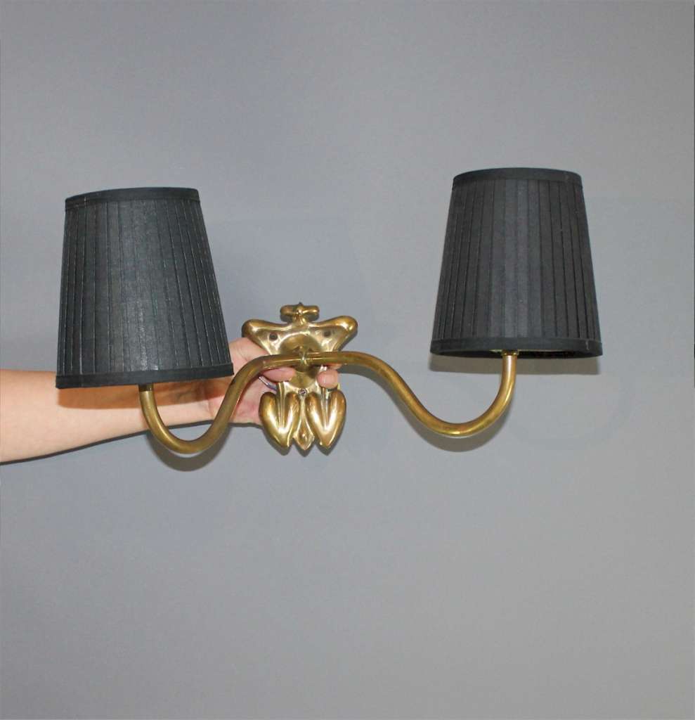 Pair of arts and crafts brass wall lights