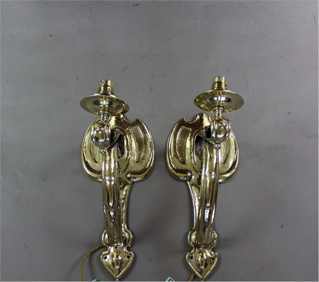 Pair of Arts and Crafts wall lights in brass c1900