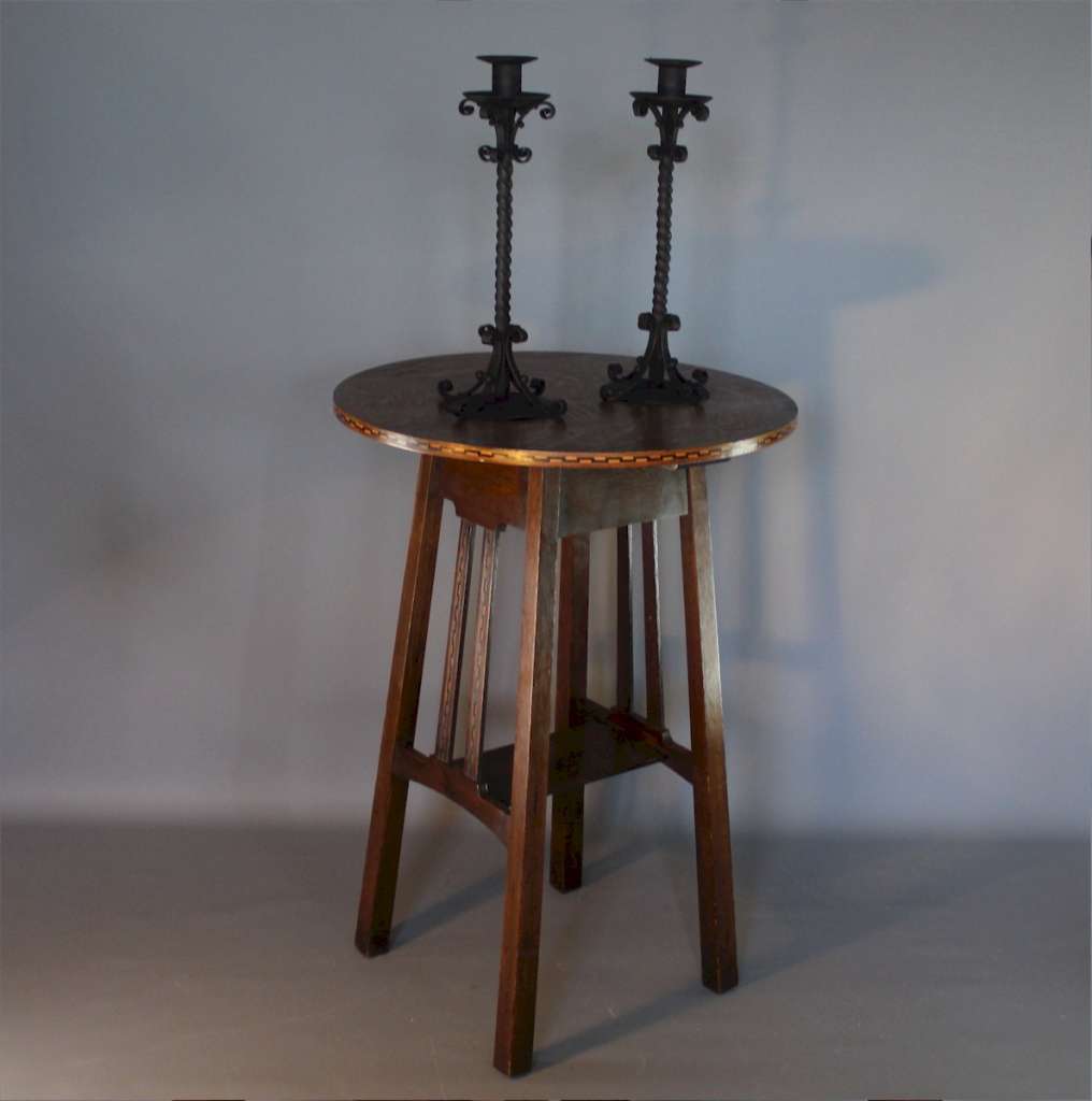 Pair of twisted iron candlesticks
