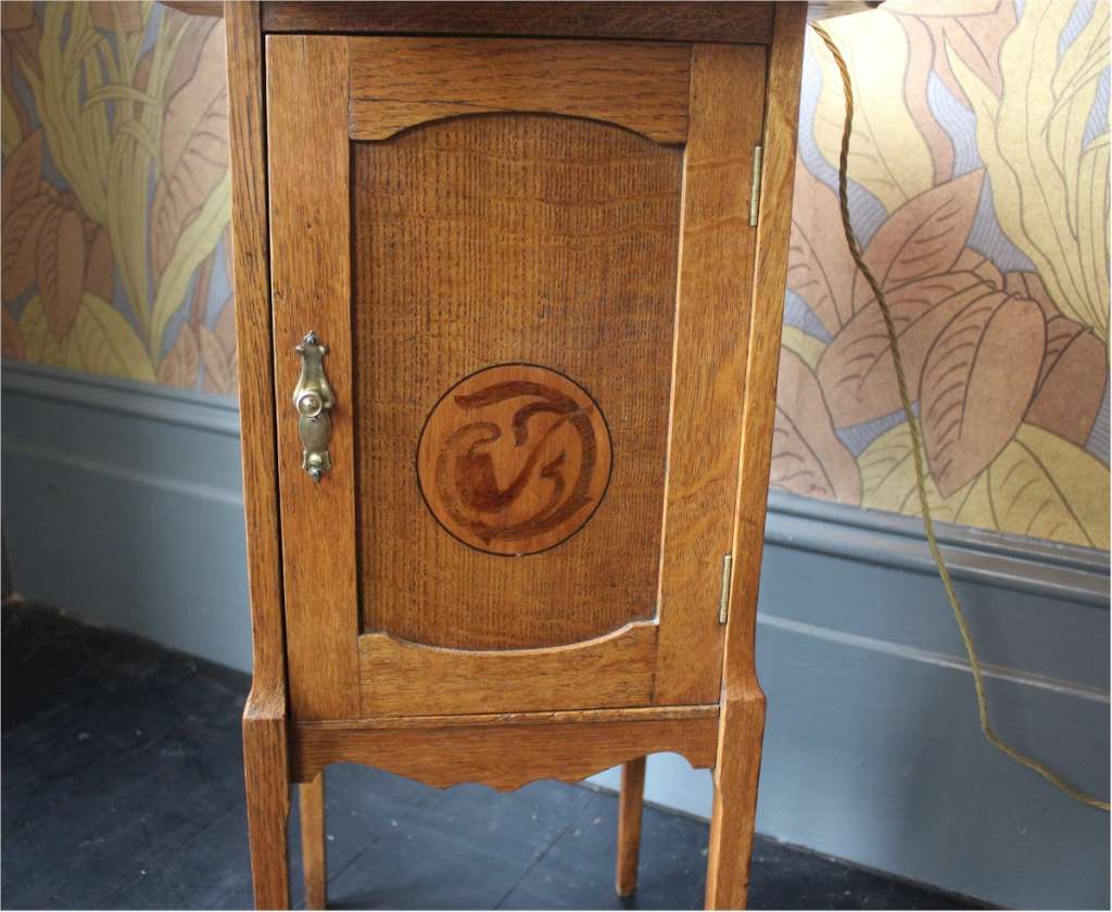 Arts and Crafts oak bedside cabinet inlaid.