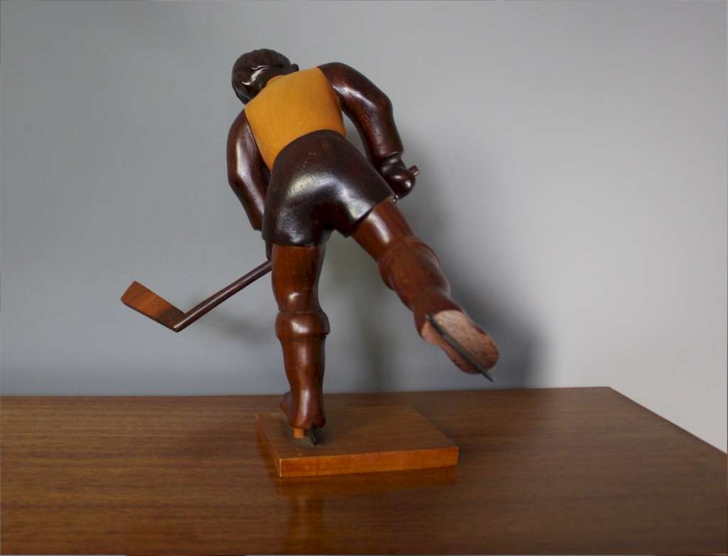 Italian mid-century Romer vintage carved figure of an ice hockey player