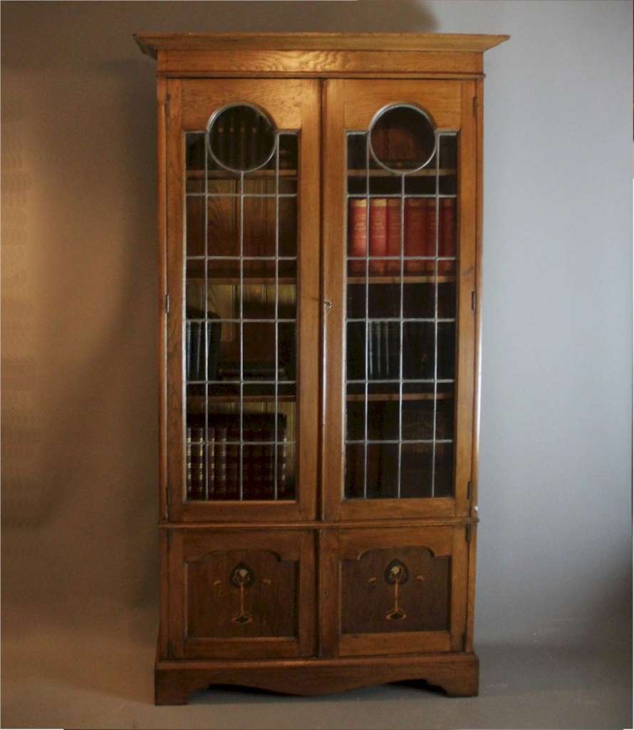 Arts and Crafts glazed bookcase in oak
