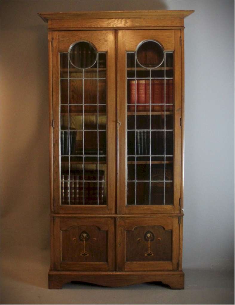 Arts and Crafts glazed bookcase in oak