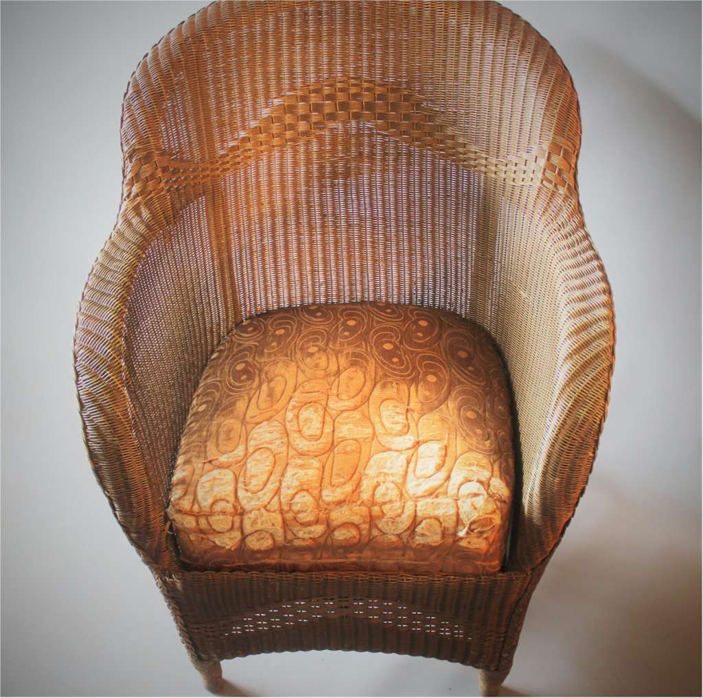 Lloyd loom armchair with gold weave