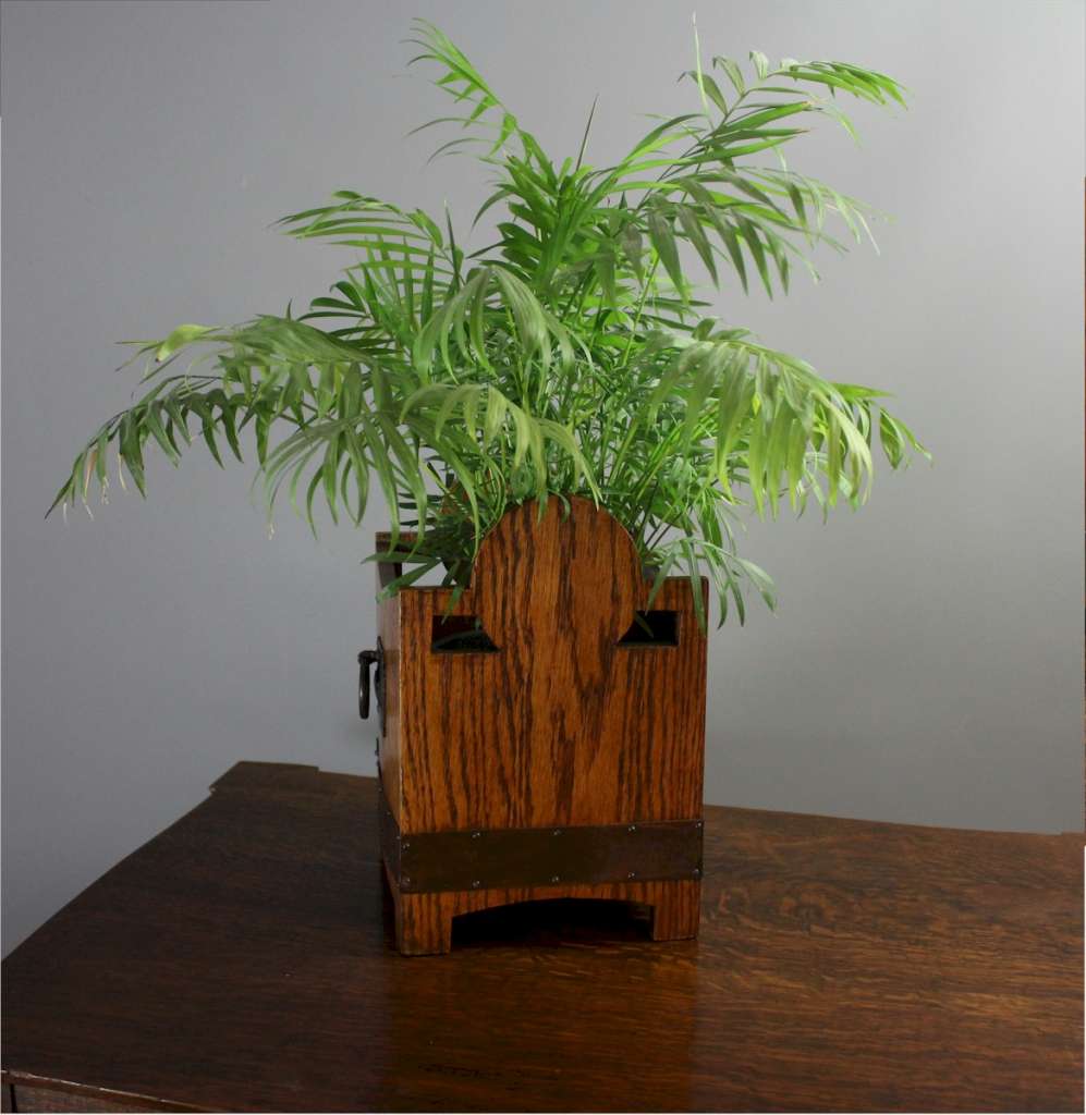 Small arts and crafts planter with copper bandings,