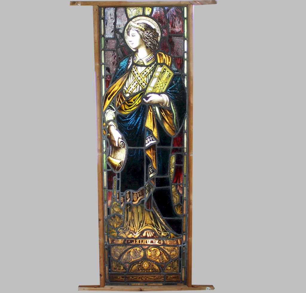 Victorian pre-raphaelite stained glass angel.