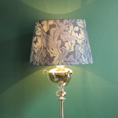 Victorian brass standard lamp in the manner of Hinks and Benson
