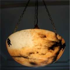 Alabaster ceiling shade with pinkish grain.