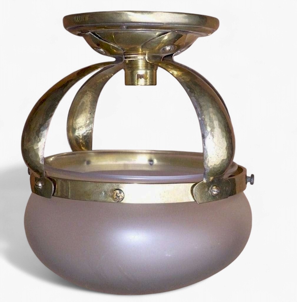 Small domed ceiling light in hammered brass