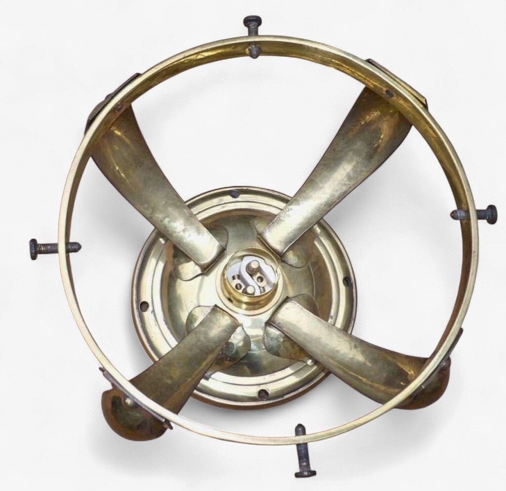 Small domed ceiling light in hammered brass