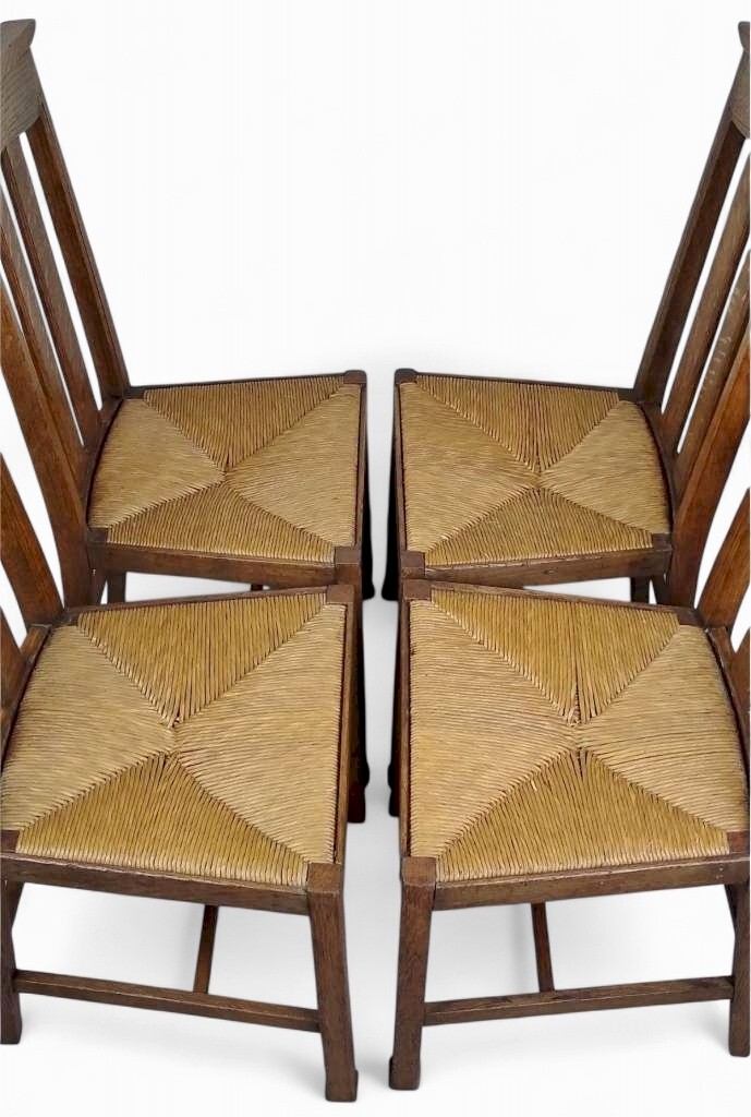  Arts and crafts oak dining chairs by Liberty