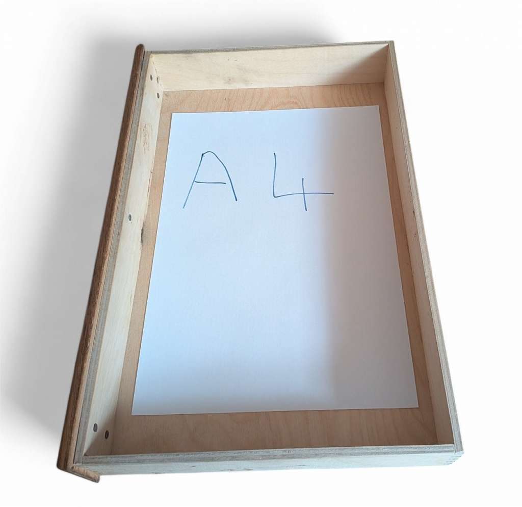 Tabletop filing cabinet holds A4 paper