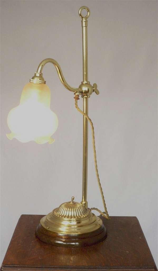 Adjustable desk lamp in brass