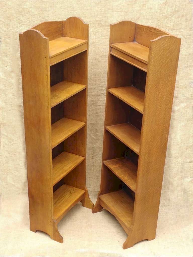 Near pair of Heals oak bookcases