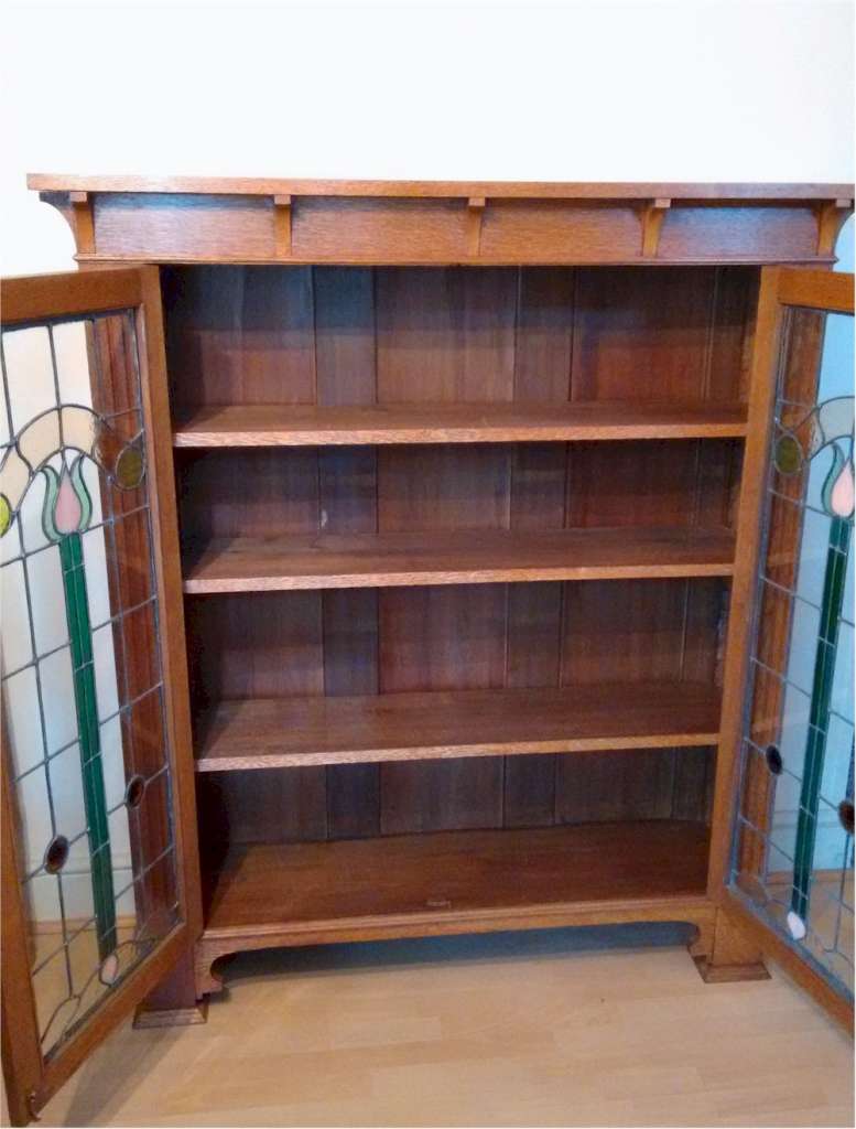 Larger arts and crafts bookcase , leaded glass