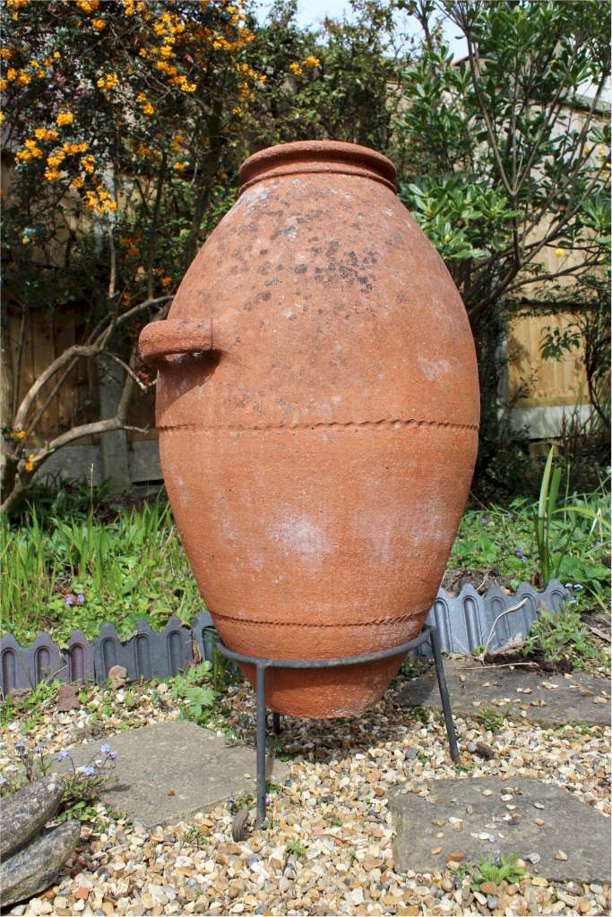 Large terracotta olive oil garden urn with one handle