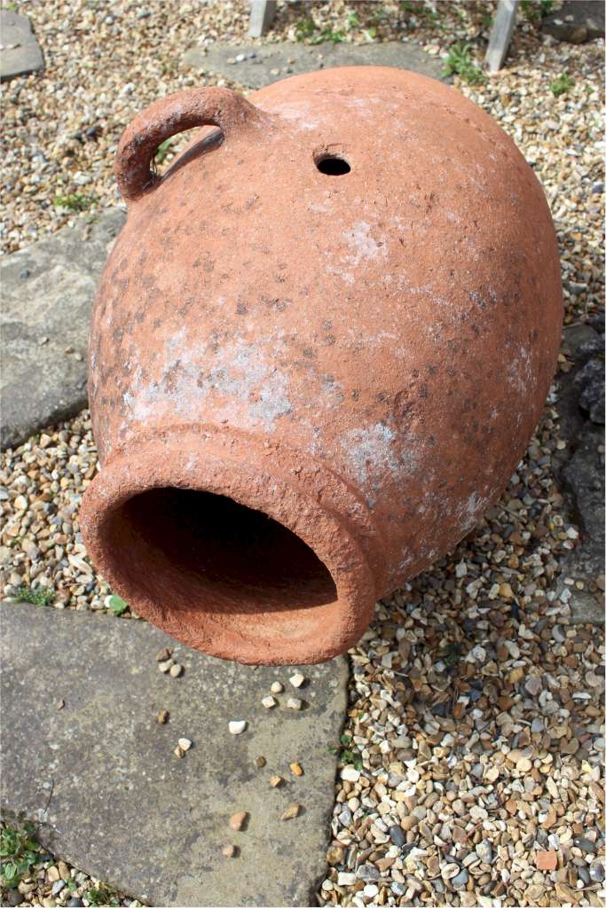 Large terracotta olive oil garden urn with one handle
