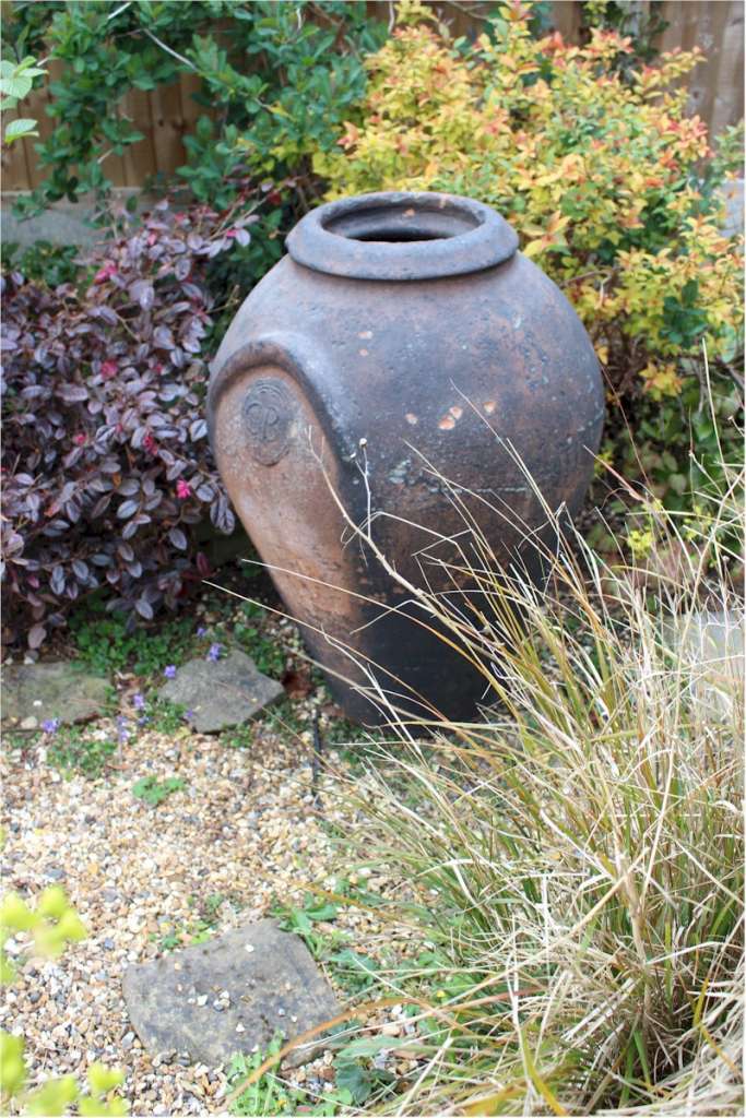 Large antique European olive terracotta garden urn